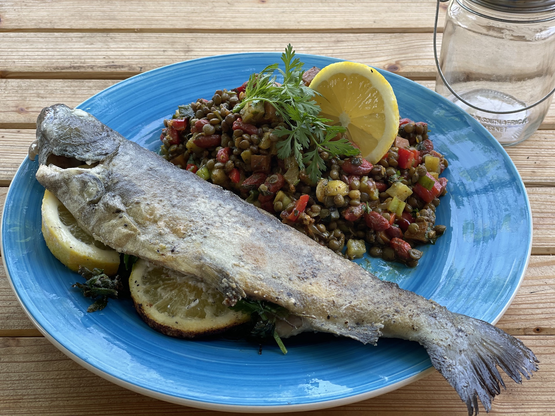 Fruity green lentils oriental style with balkan trout